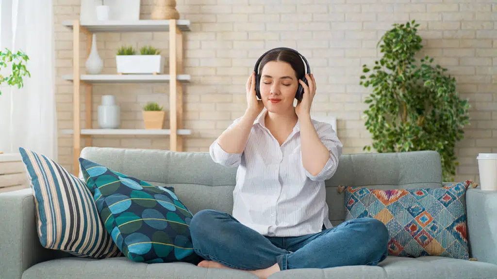 woman listening music headphones